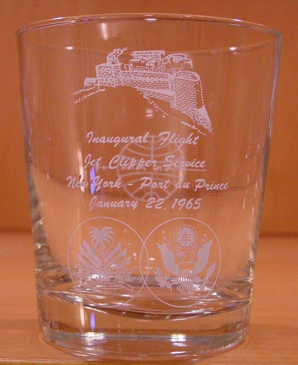 1965 January  22, A glass for the Inaugural jet flight from New York City to Port au Prince, Haiti.